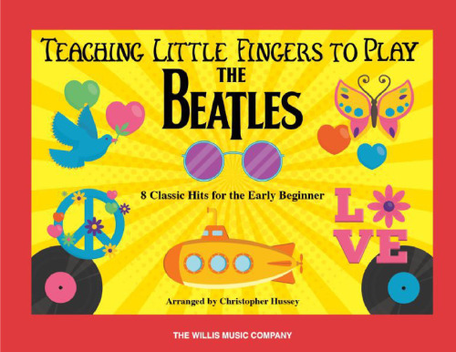 Teaching little fingers to play The Beatles